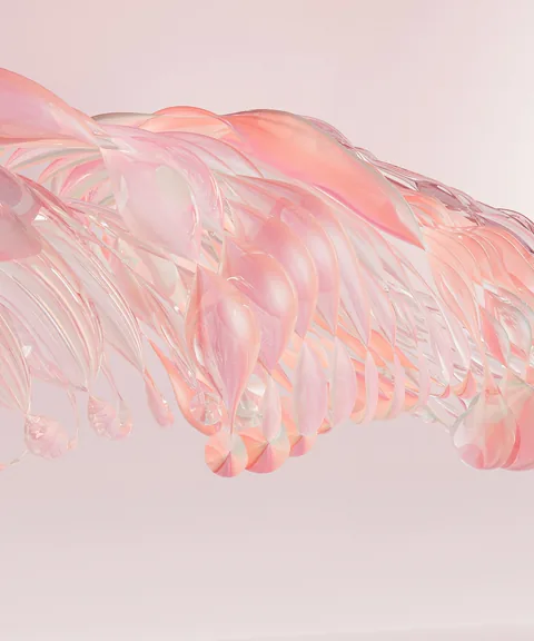 A translucent glass sculpture suspended against a soft pink background